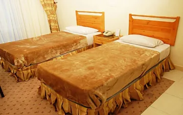 مهمانسرا جهانگردی چلندر نوشهر - اتاق 2 تخته (2 تخت 1 نفره)