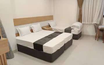 هتل نگین هشتم مشهد - اتاق 3 تخته (1 تخت 2 نفره 1 تخت 1 نفره)