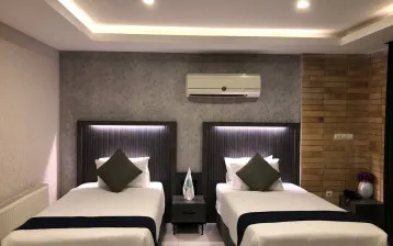 خانه مسافر دلگشا شیراز - اتاق 2 تخته (2 تخت 1 نفره)