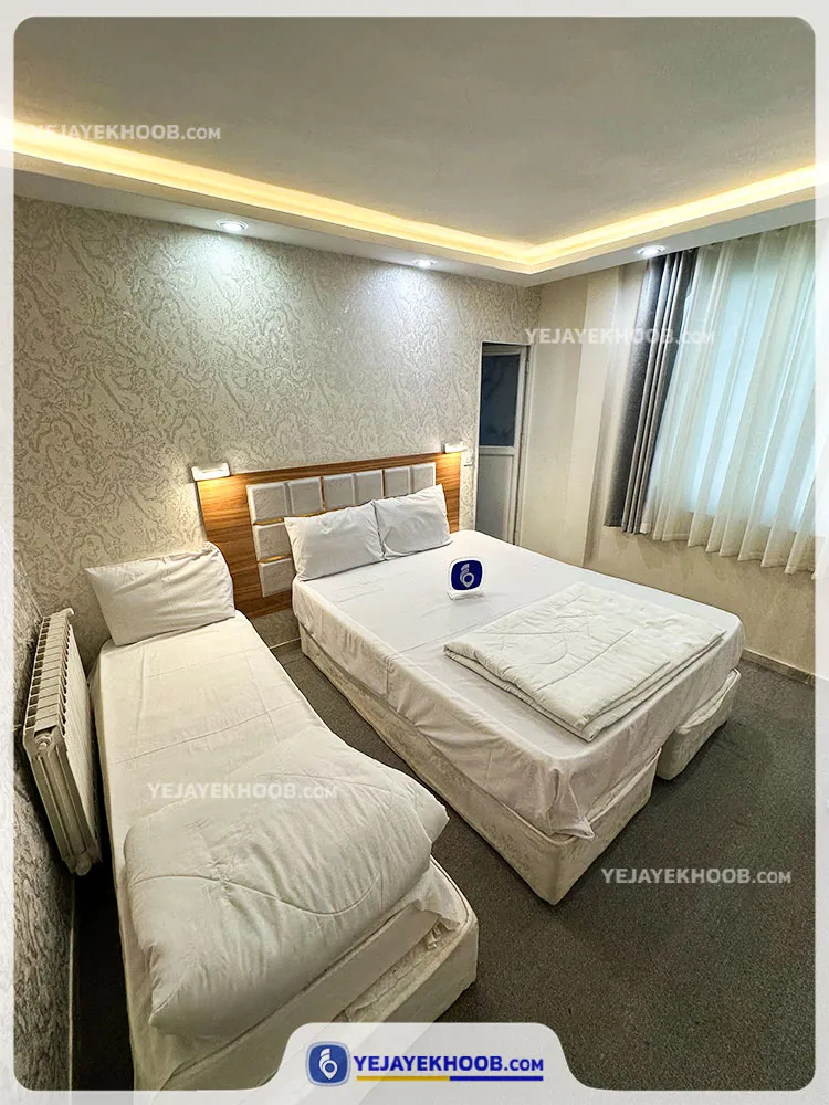 هتل آپارتمان خاطره مشهد - اتاق 3 تخته (1 تخت 2 نفره و 1 تخت 1 نفره)