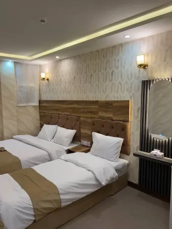 هتل عالی نو مشهد - اتاق ۳ تخته (۱ تخت ۲ نفره + ۱ تخت ۱ نفره)