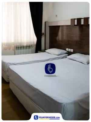 هتل آپارتمان رهام مشهد - اتاق 3 تخته (1 تخت 2 نفره و 1 تخت 1 نفره)