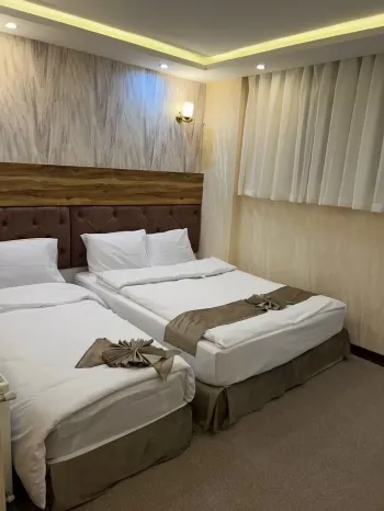هتل عالی نو مشهد - اتاق ۳ تخته (۱ تخت ۲ نفره + ۱ تخت ۱ نفره)