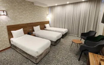 هتل فاطیما قم - اتاق 3 تخته (3 تخت 1 نفره)