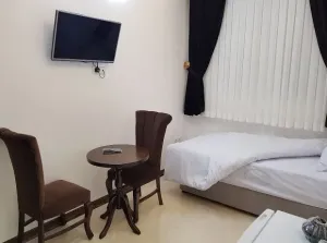 خانه مسافر سپیدار قم - اتاق 1 تخته (1 تخت 1 نفره)