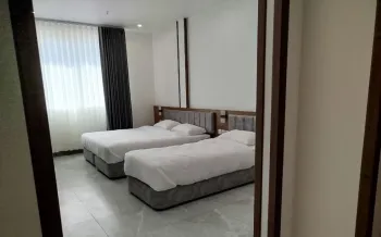 هتل یلدا قم - اتاق 3 تخته (1 تخت 2 نفره 1 تخت 1 نفره)