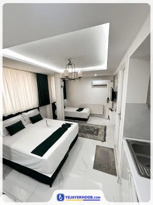 هتل آپارتمان پنجتن مشهد - اتاق 3 تخته (1 تخت 1 نفره و 1 تخت 2 نفره)