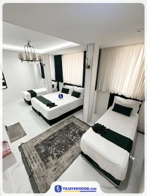 هتل آپارتمان پنجتن مشهد - اتاق 4 تخته (1 تخت 2 نفره و 2 تخت 1 نفره)