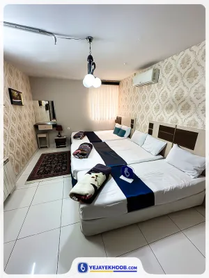 هتل آپارتمان صانع مشهد - اتاق 5 تخته (2 تخت 2 نفره و 1 تخت 1 نفره)