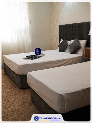 هتل مینو مشهد - اتاق 3 تخته (1 تخت 2 نفره و 1 تخت 1نفره)