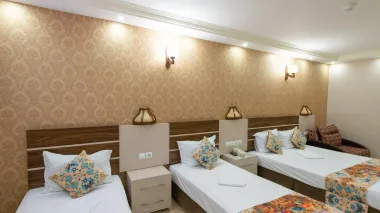 هتل ونوس اصفهان - اتاق 4 تخته (2 تخت 1 نفره و 2 تخت 1 نفره)