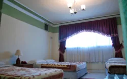 هتل آپارتمان رازی تهران - اتاق 4 تخته (1 تخت 2 نفره 2 تخت 1 نفره)