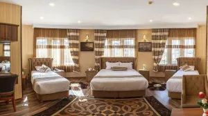 هتل بهار تهران - اتاق 4 تخته (1 تخت 2 نفره 2 تخت 1 نفره)