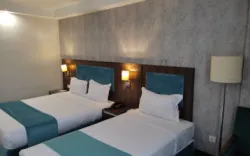 هتل انقلاب تهران - اتاق 3 تخته (1 تخت 2 نفره 1 تخت 1 نفره)