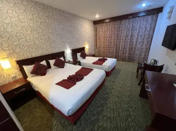 هتل پارمیدا کیش - اتاق 3 تخته (1 تخت 2 نفره 1 تخت 1 نفره)