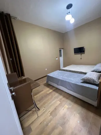 هتل ترن تهران - اتاق 3 تخته (1 تخت 2 نفره و 1 تخت 1 نفره)