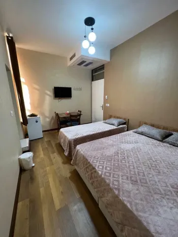 هتل ترن تهران - اتاق 3 تخته (1 تخت 2 نفره و 1 تخت 1 نفره)