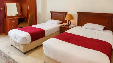 هتل آپارتمان کوروش تهران - اتاق 3 تخته (1 تخت 2 نفره و 1 تخت 1 نفره)