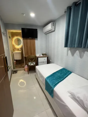 هتل آپارتمان رز تهران - اتاق 1 تخته (1 تخت 1 نفره)