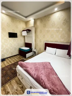 هتل آپارتمان کمال مشهد - اتاق ۲ تخته (1 تخت 2 نفره ) همراه با کاناپه تختخوابشو