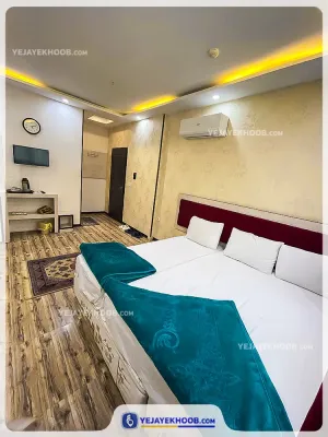 هتل آپارتمان کمال مشهد - اتاق 3 تخته (1 تخت 2 نفره و 1 تخت 1 نفره)