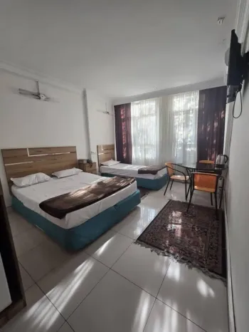 هتل اخوت تهران - اتاق 3 تخته (1 تخت 2 نفره 1 تخت 1 نفره)