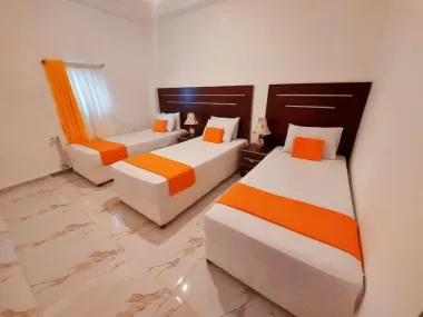 هتل باغ ارغوان رامسر - اتاق 3 تخته (3 تخت 1 نفره)