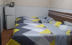 خانه مسافر وارش قم - اتاق 3 تخته (1 تخت 2 نفره 1 تخت 1 نفره)