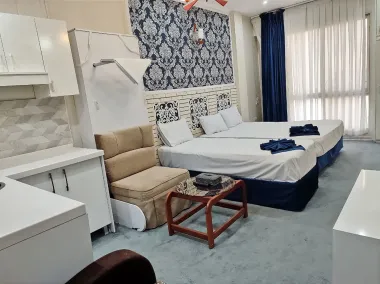 هتل آپارتمان کنعان مشهد - اتاق 3 تخته (1 تخت 2 نفره 1 تخت 1 نفره)