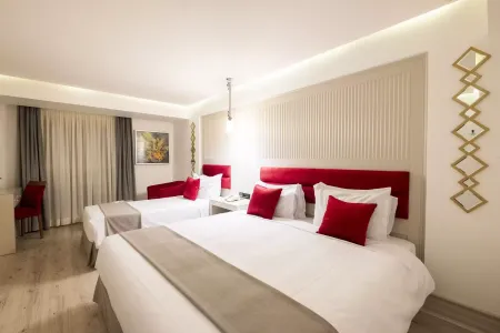 هتل اترک مشهد - اتاق 3 تخته (1 تخت 2 نفره 1 تخت 1 نفره)