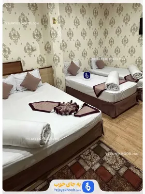 هتل الرحمان مشهد - اتاق 4 تخته (1 تخت 2 نفره و 2 تخت 1 نفره)