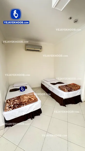 مسافرخانه نعیم مشهد - اتاق ۲ تخته (۲ تخت ۱ نفره)
