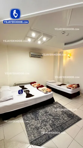 مسافرخانه نعیم مشهد - اتاق ۳ تخته (۱ تخت ۲ نفره و ۱ تخت ۱ نفره)
