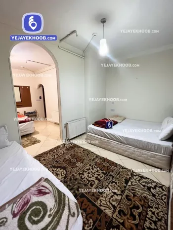 هتل آپارتمان بهاران مشهد - اتاق ۴ تخته (۱ تخت ۲ نفره و ۲ تخت ۱ نفره)  