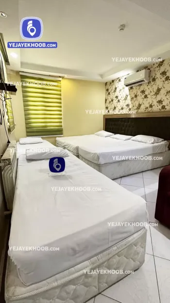 هتل آپارتمان شریف جواهری مشهد - اتاق ۵ تخته (۱ تخت ۲ نفره و ۳ تخت ۱ نفره)