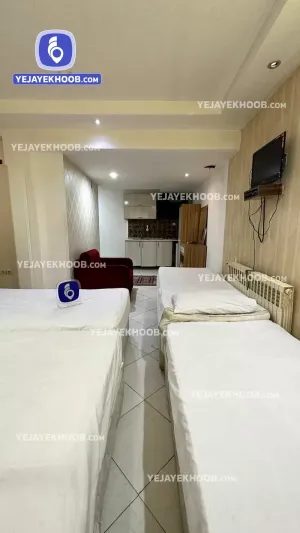 هتل آپارتمان شریف جواهری مشهد - اتاق ۵ تخته (۱ تخت ۲ نفره و ۳ تخت ۱ نفره)