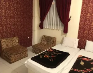 هتل آپارتمان فاخته مشهد - اتاق ۲ تخته (۲ تخت ۱ نفره)