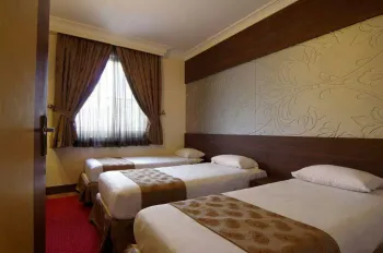 هتل آپارتمان مهر مشهد - اتاق ۳ تخته (۳ تخت ۱ نفره)    