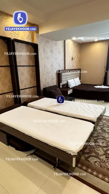 هتل آپارتمان نخل فردوس مشهد - اتاق 4 تخته (1 تخت 2 نفره و 2 تخت 1 نفره)