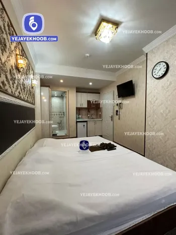 هتل آپارتمان وطن مشهد - اتاق ۳ تخته (۳ تخت ۱ نفره)    