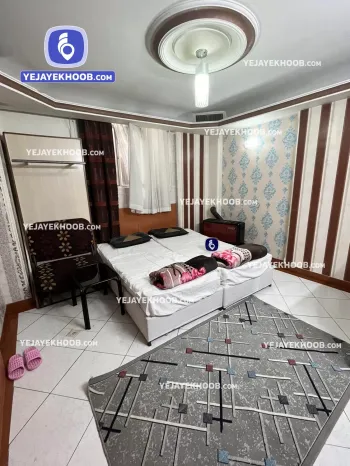 هتل آپارتمان گردشگران مشهد - اتاق ۲ تخته (۲ تخت ۱ نفره) همراه با کاناپه تختخوابشو