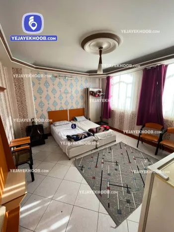 هتل آپارتمان گردشگران مشهد - اتاق ۲ تخته (۲ تخت ۱ نفره) همراه با کاناپه تختخوابشو