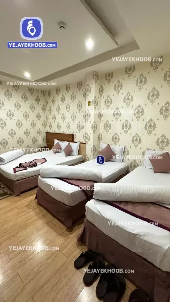 هتل الرحمن مشهد - اتاق ۴ تخته (۱ تخت ۲ نفره و ۲ تخت ۱ نفره)  