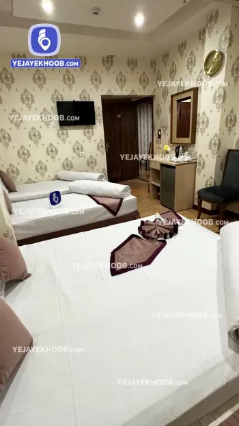 هتل الرحمن مشهد - اتاق ۴ تخته (۱ تخت ۲ نفره و ۲ تخت ۱ نفره)  