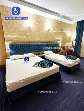 هتل ایران زمین مشهد - اتاق ۳ تخته (۱ تخت ۲ نفره و ۱ تخت ۱ نفره)