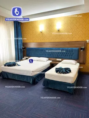 هتل ایران زمین مشهد - اتاق ۳ تخته (۱ تخت ۲ نفره و ۱ تخت ۱ نفره)