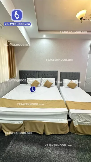 هتل محمدی شاهان مشهد - اتاق ۳ تخته (۱ تخت ۲ نفره و ۱ تخت ۱ نفره) 