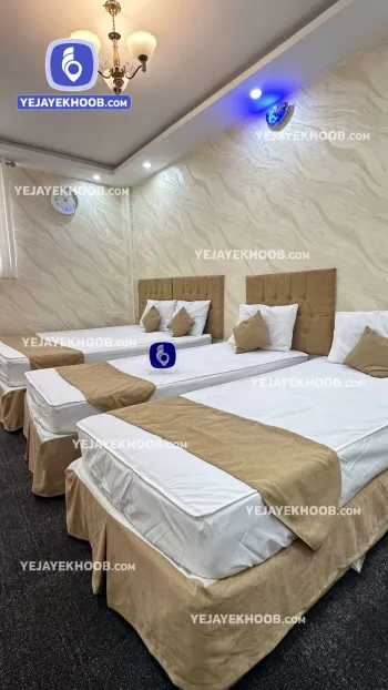 هتل محمدی شاهان مشهد - اتاق ۴ تخته (۱ تخت ۲ نفره و ۲ تخت ۱ نفره)