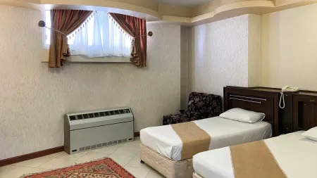 هتل ماهان اصفهان - اتاق 3 تخته (1 تخت 2 نفره و 1 تخت 1 نفره)