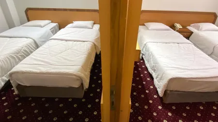 هتل ملل اصفهان - اتاق 4 تخته (4 تخت 1 نفره)